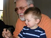 Gage-MaxsNanny > Gage with PaPaw Sonny eating his birthday cake at Cracker Barrel. We went there on 3/30 to celebrate PaPaw's 60th birthday that is on April 2.