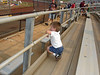 Gage-MaxsNanny > Watching at the dirt tract before the monster truck show.